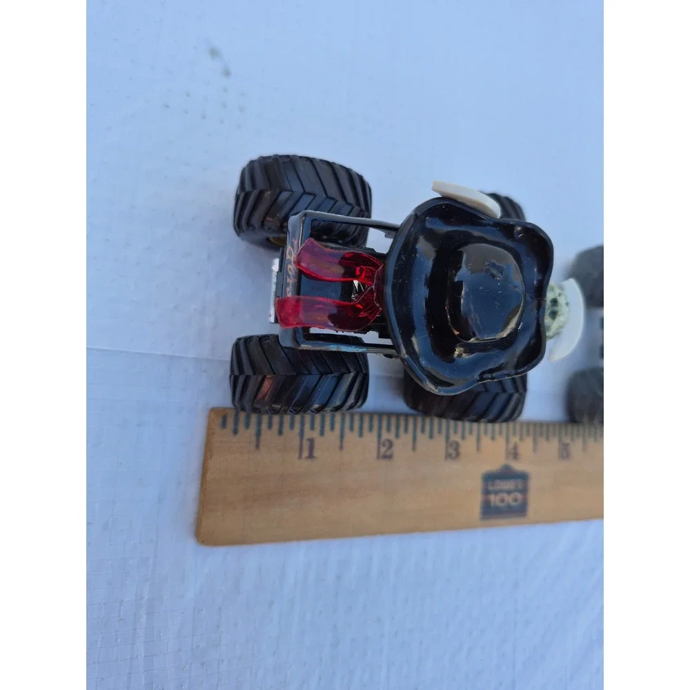 Monster Jam Pirates Curse and Zombie vs Hunter Earth Shaker Die-Cast Truck Lot